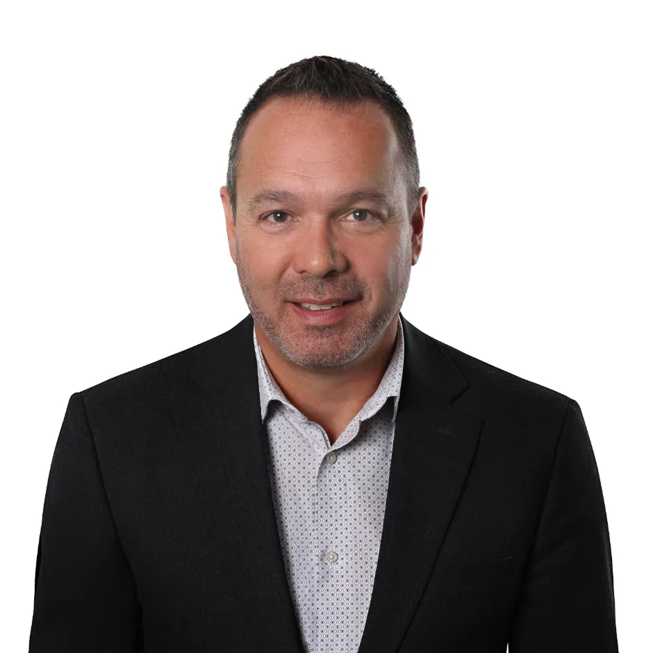 Headshot of Yves Grenier